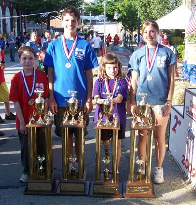 2009 Port Jervis Soapbox Derby Winners Erik Hawkins, Tyler Gibbs, Theresa Bell and Andrea McKerrell. (L to R)